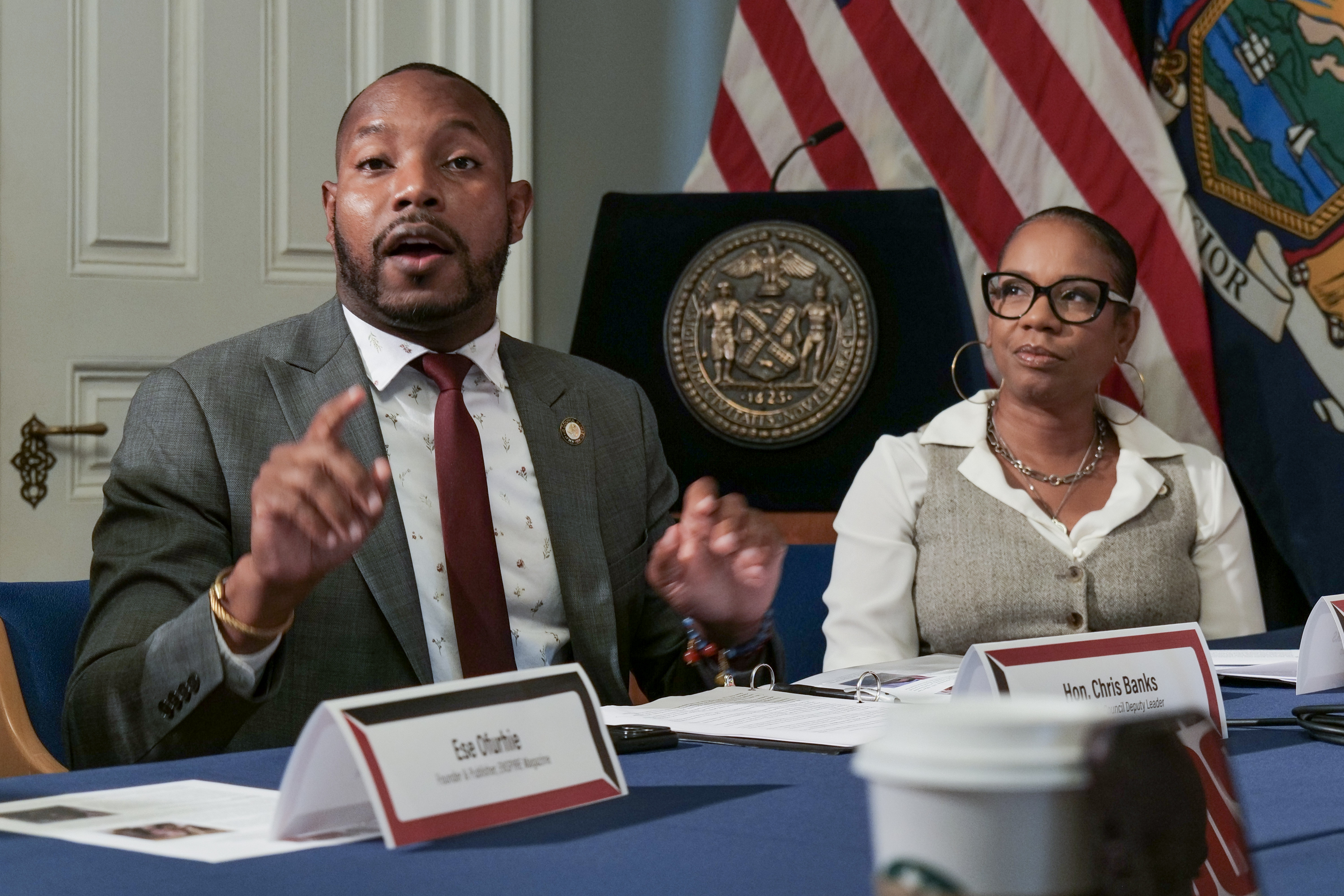 New York City Council Deputy Leader Chris Banks speaks as Majority Whip Kamillah M. Hanks looks on at City Hall